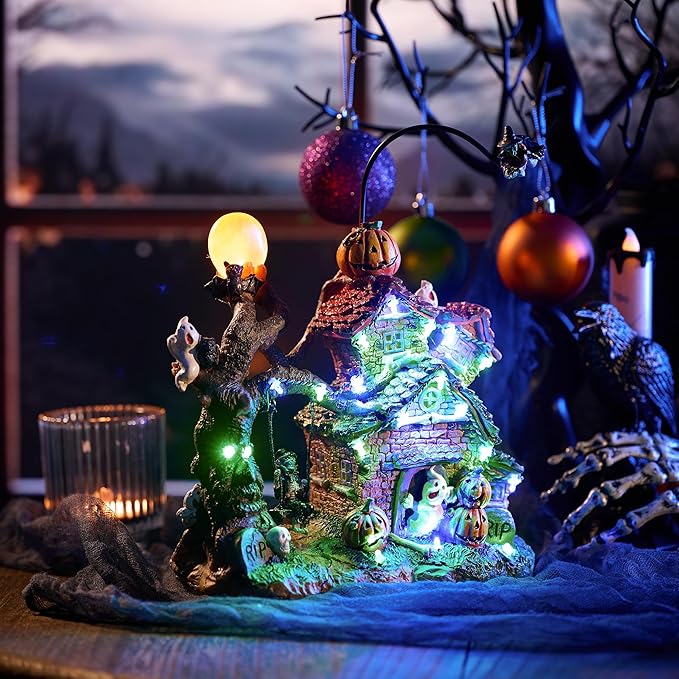Valery Madelyn Halloween Decorations, Lighted Halloween Village Houses with Music and LED Lights, Resin Spooky Town Flying Witch and Haunted House for Home and Party Table Desk Mantel, 12 Inch