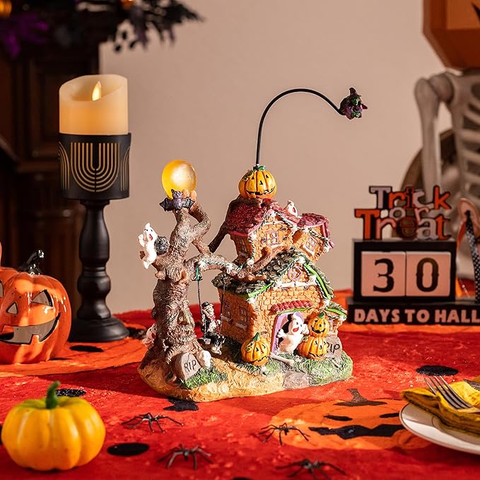 Valery Madelyn Halloween Decorations, Lighted Halloween Village Houses with Music and LED Lights, Resin Spooky Town Flying Witch and Haunted House for Home and Party Table Desk Mantel, 12 Inch