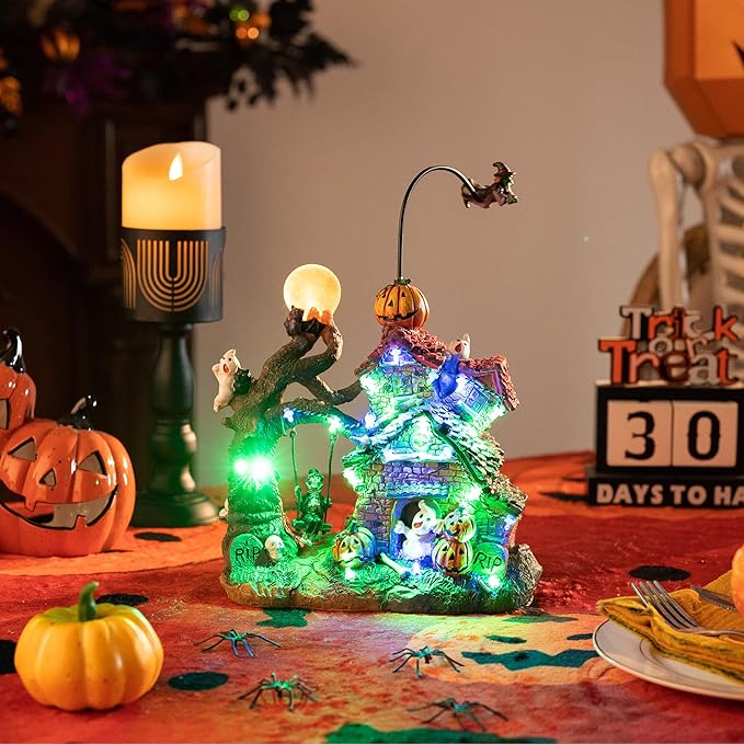 Valery Madelyn Halloween Decorations, Lighted Halloween Village Houses with Music and LED Lights, Resin Spooky Town Flying Witch and Haunted House for Home and Party Table Desk Mantel, 12 Inch