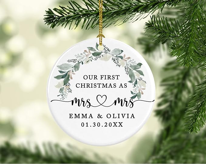 Andaz Press Personalized Our First Christmas As Mrs. & Mrs. Christmas Ornaments 2025 Foliage Wreath 2.8" Round Porcelain Ceramic Lesbian Christmas Ornament Married Couple Gay Women Newlyweds 1-Pack