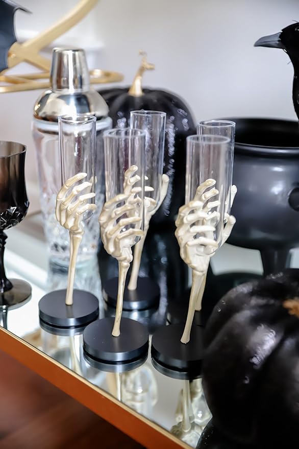Fun Express Set of 12 Pieces Skeleton Hand Flute Glasses, Holds 2 oz, BPA Free Plastic, Halloween Party Decorations